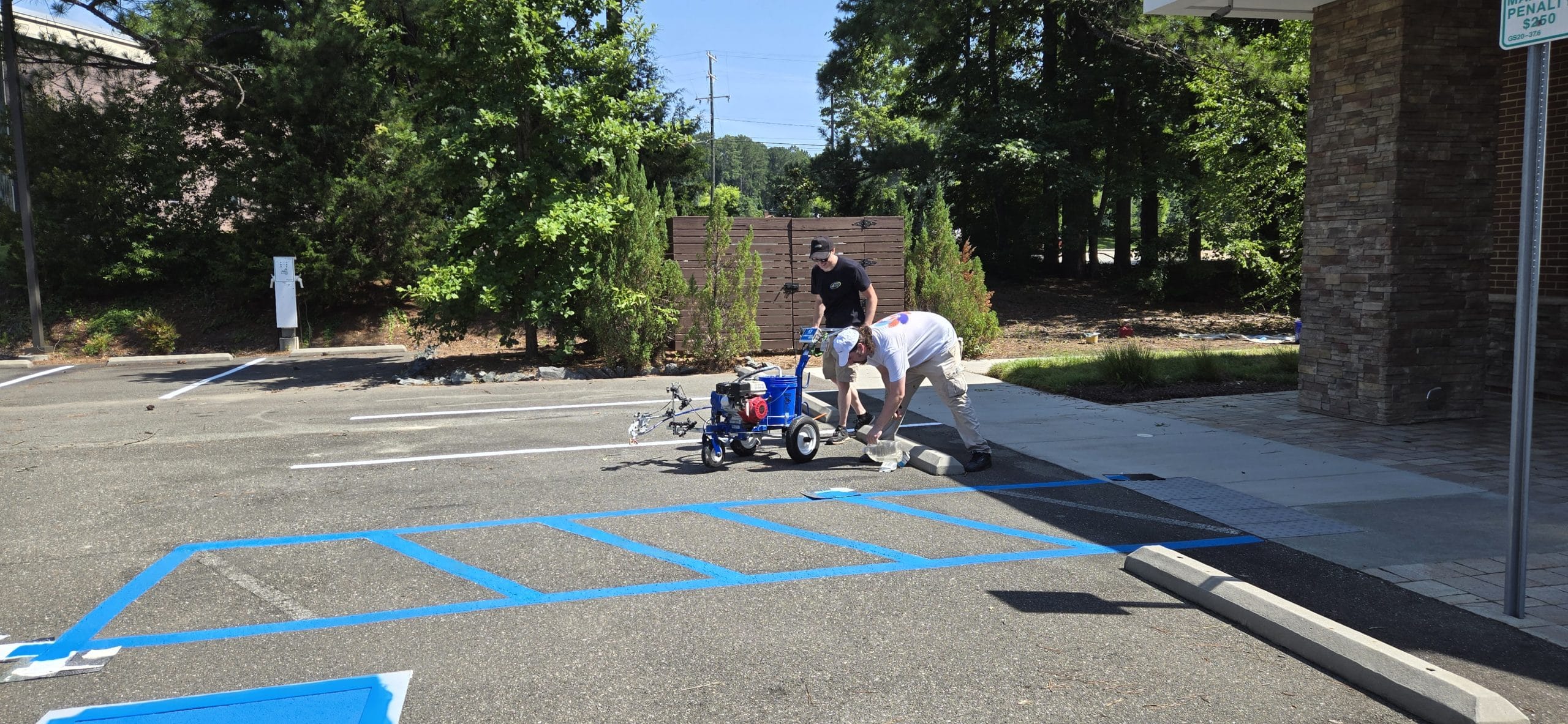 Parking lot painting crew at work